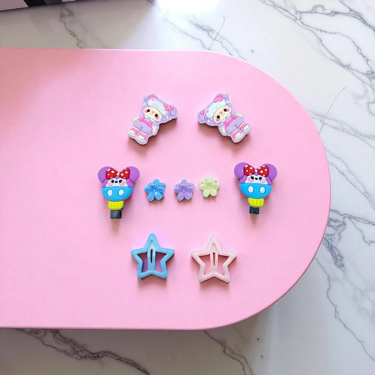 Colorful cartoon-themed hair clip set for kids featuring flowers, stars, and playful characters—perfect for school, parties, and everyday styling with lightweight, safe materials designed for all-day wear.